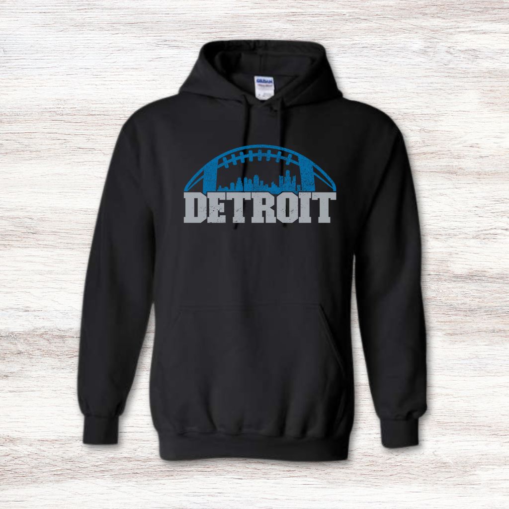 Bold Detroit skyline football graphic sweater