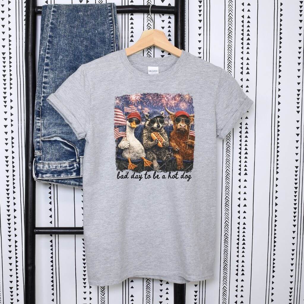 quirky july 4th outfit featuring raccoon goose cow graphic tee